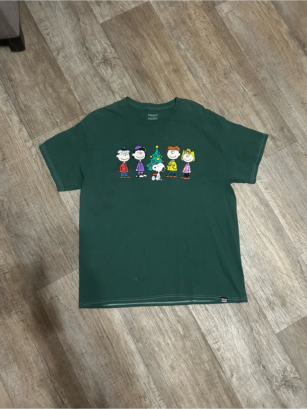 Green Peanuts Holiday Graphic Tee